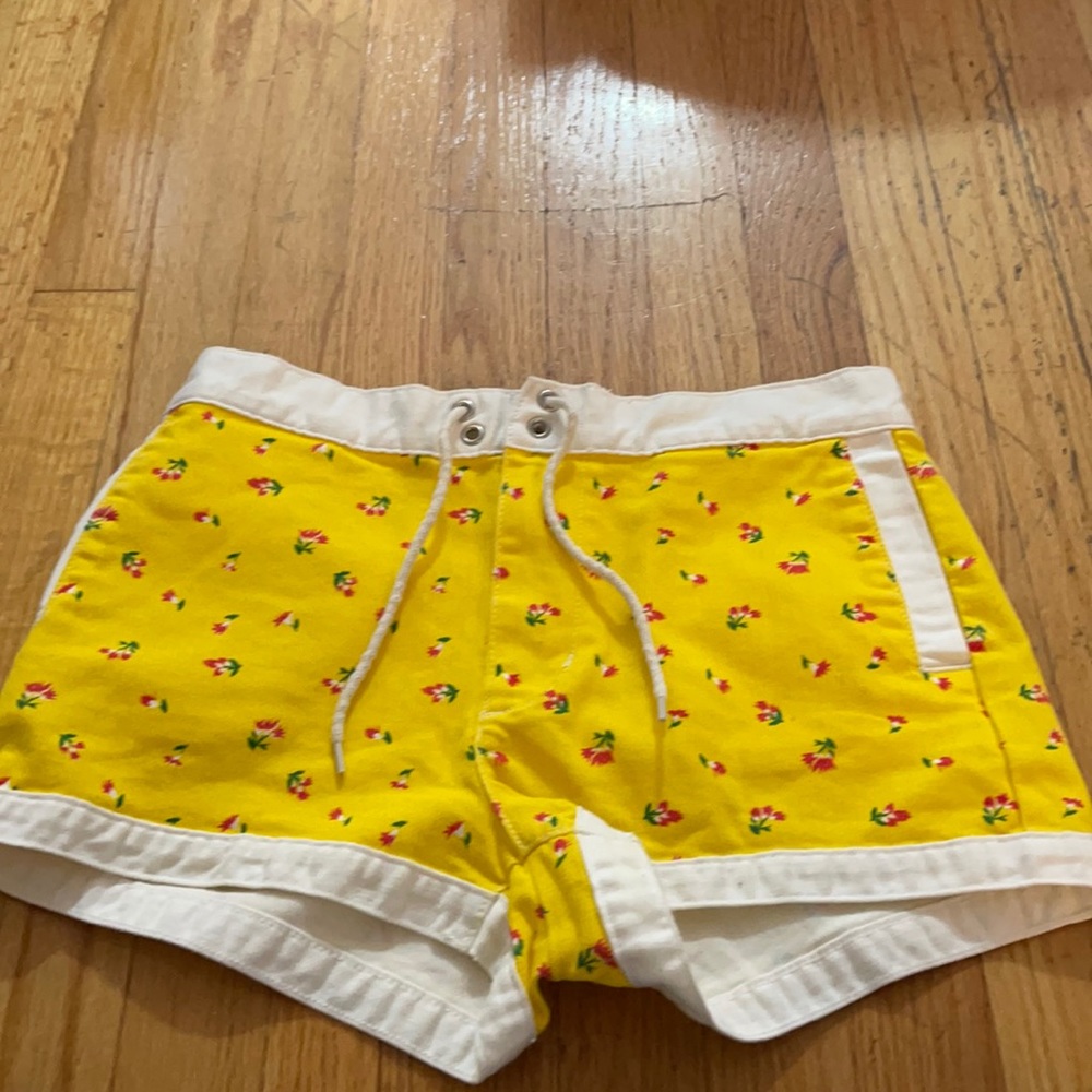 Yellow skirt with flowers .
